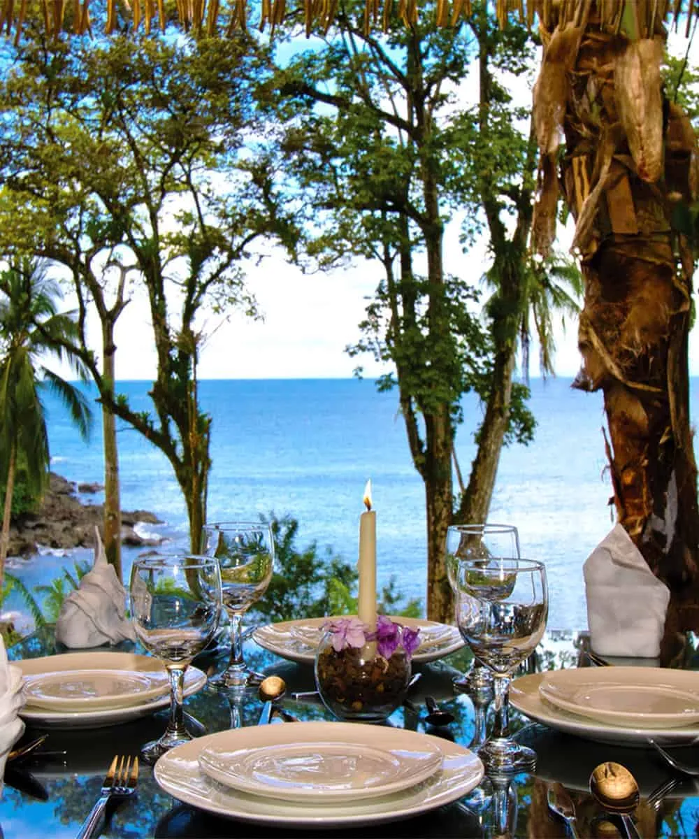 A table with a view of the ocean.